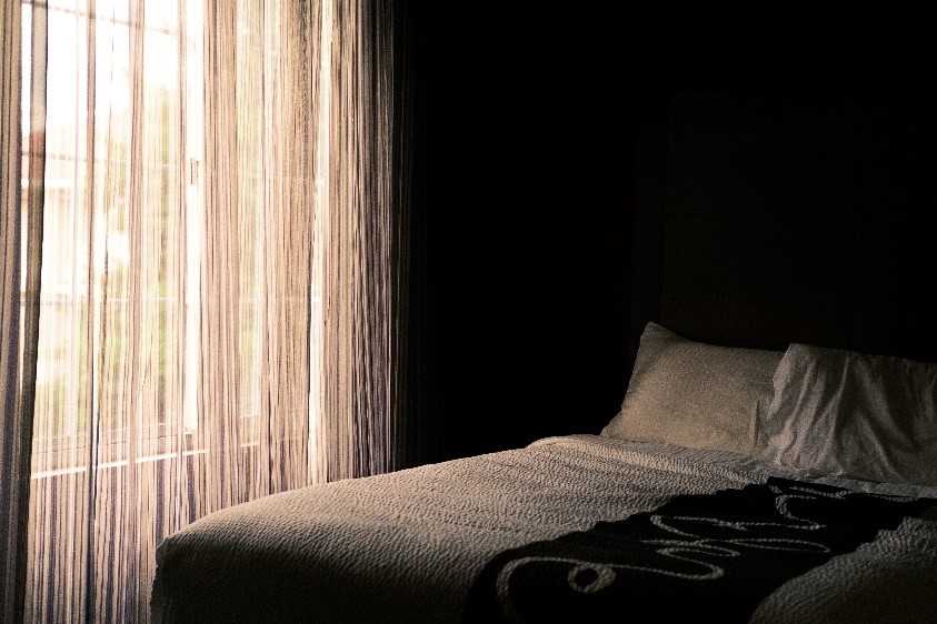 Bed and window at Greystone Crossing